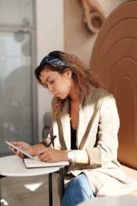 female business owner doing her checklist