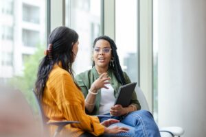 woman manager discussing with staff member