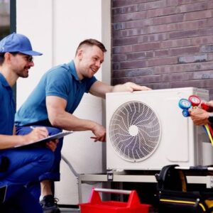 HVAC technicians working together